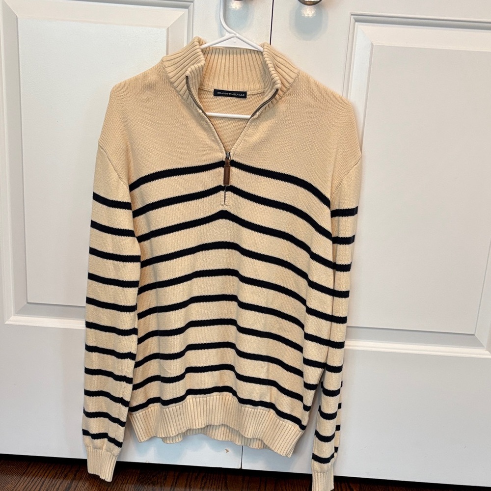 Brandy Melville black and beige striped quarter zip sweater.